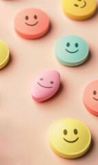 set of antidepressant pills with smiling faces, painkillers for pain and depression relief