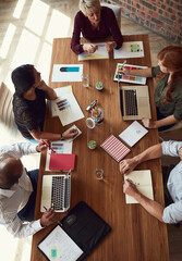 Top view, discussion and team of business people in meeting for planning strategy or brainstorming...
