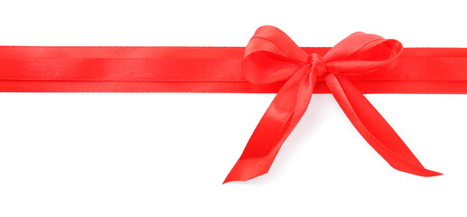 Red satin ribbons with bow isolated on white, top view