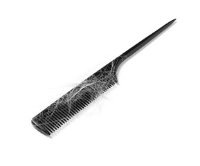 Comb with lost hair isolated on white