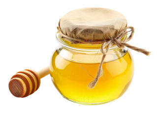 a jar of honey with a wooden dipper