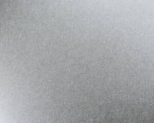 Glowing silver white grainy gradient vector background.