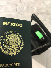 Mexican passport close up with baggage 