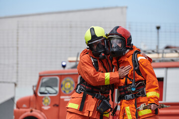Firefighter Team Training with Various Tools in Professional Gear