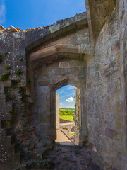 Looking out through a doorway at Raglan Castle (Wales, United Kingdom)