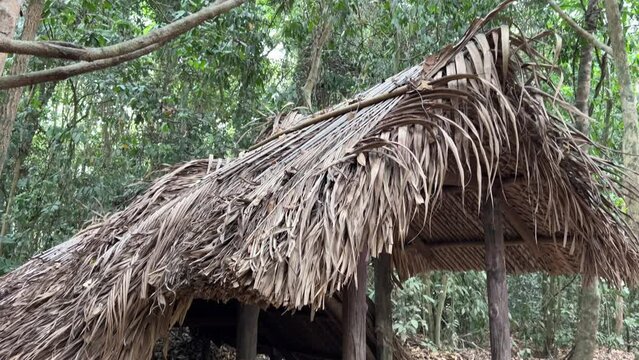 dungeon entrance tunnel camouflaged Cu Chi tunnels were the Viet Cong's base of operations for the Tet Offensive in 1968. Famous tourist attraction in Vietnam