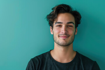 Fototapeta premium A close up portrait of a young man with a subtle smile
