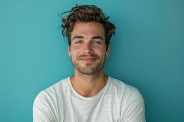 Fototapeta premium A close up portrait of a young man with a subtle smile