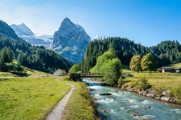 Rosenlaui with wellhorn swiss alps and Reichenbach river in summer at Switzerland