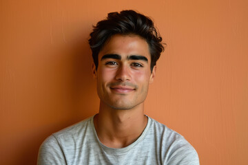 Fototapeta premium A close up portrait of a young man with a subtle smile