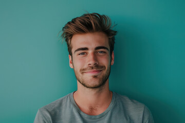 Fototapeta premium A close up portrait of a young man with a subtle smile