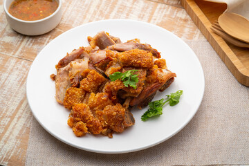 Deep Fried Pork Knuckle,Sliced crispy pork in white plate
