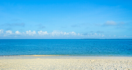Beach and blue sky for summer background