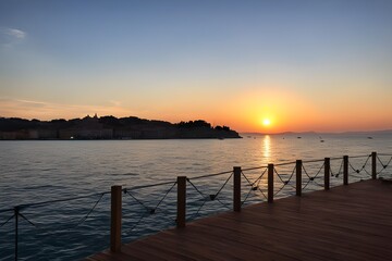 Obraz premium Beatifull sunset in an Italian restoraunt with a sea view