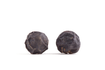Black pepper. Peppercorns isolated on white.