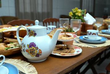 tea set on a table,  breakfast in the morning, table setting, table setting for a dinner, table and chairs in a restaurant, table and chairs, breakfast table, hotel breakfast, afternoon tea, set table