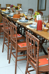 table and chairs in a restaurant, table and chairs, breakfast table, hotel breakfast, afternoon tea, set table, abundant table
