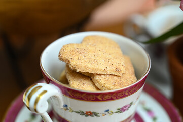cup of coffee, close up of cookie, cup of tea with cookies, cup of coffee and cookies, cup of tea and cookies, porcelain cup, antique china, fine china, breakfast, afternoon tea, coffee shop,cafeteria