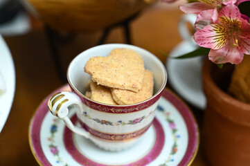 cup of coffee, coffee and cookies, cup of tea with cookies, cup of coffee and cookies, cup of tea and cookies, porcelain cup, antique china, fine china, breakfast, afternoon tea, coffee shop,cafeteria