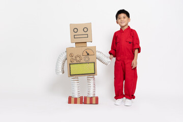 Asian little boy standing toy robot paper diy isolated on white background, Artificial intelligence...