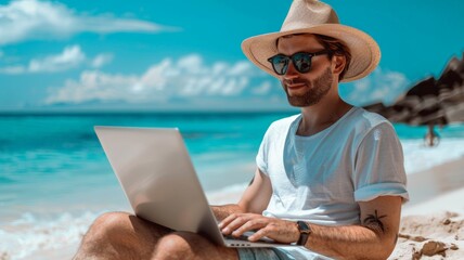 Fototapeta premium Young Man Working on Laptop While Relaxing on Tropical Beach