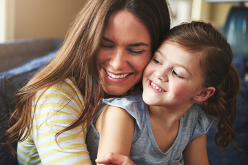 Smile, woman and child hug or love on sofa for trust, bonding and support of relationship moment....