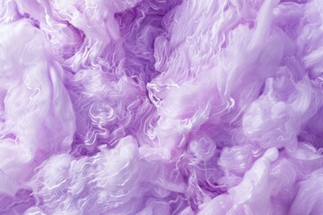 A detailed shot of a pile of soft purple wool