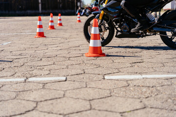 Riding between cones, lesson in motorcycle school