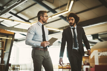 Business people, tablet and discussion or walking in office with talking for project management and client briefing. Manager, employee and networking with digital tech for teamwork on corporate ideas