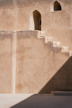 Traditional Omani Adobe Architecture with Staircase