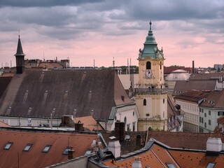 Obraz premium View of the Old Town Hall above the roofs of houses in Bratislava, Slovakia