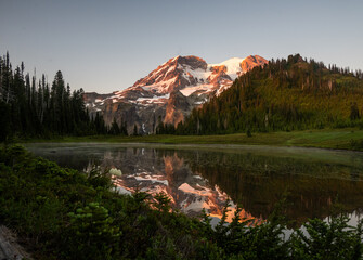 Aurora Lake Reflects Mount Rainier in Shallow Waters