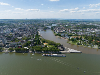 Aerial drone view of the deutsche Eck, monument in the city of Koblenz, Germany at sunset.