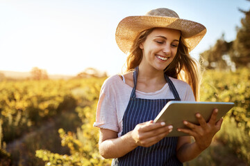 Tablet, farmer and happy woman online for agriculture research, sustainability or plant growth outdoor at field. Digital technology, farm or person at countryside for planning food production or agro