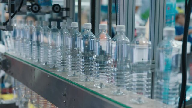 Row of Plastic Bottles on Production Line