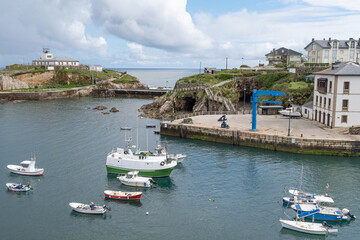 Fototapeta premium Tapia de Casariego Pier and Lighthouse. TWestern Coast of Asturias