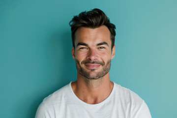 Obraz premium A close up portrait of a young man with a subtle smile