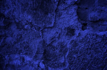 Dark blue color with an old grunge wall concrete texture as a background. Beautiful Decorative Navy Blue Stucco Wall Background. Art Abstract Grunge Texture Web Banner With Copy Space for design