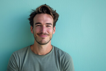 Obraz premium A close up portrait of a young man with a subtle smile