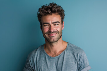 Obraz premium A close up portrait of a young man with a subtle smile