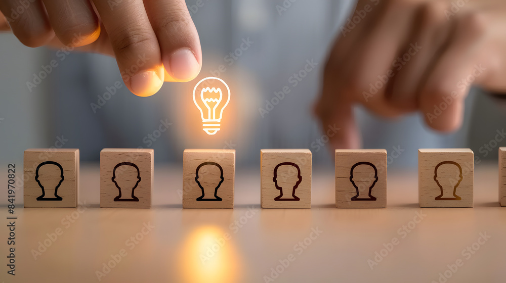 Poster a hand is placing wooden blocks with human head icons on them in a row. each block containing an ill