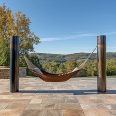 A stylish, modern hammock suspended between two sleek metal posts, set on a smooth, stone patio, offering a unique and minimalist twist on traditional backyard relaxation.