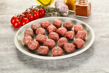 Uncooked raw beef meatball minced