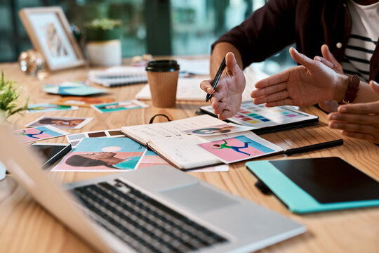 Laptop, teamwork and hands of people for graphic design, research and online project collaboration in office. Digital, internet and creative ideas for workshop with technology, notebook and advice.