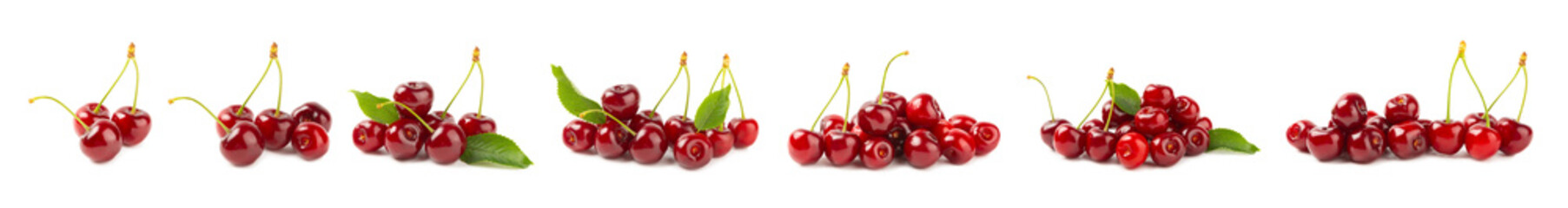 Cherry isolated. Fresh ripe cherries with leaves isolated on a white background.Sweet cherries pile. Berries and fruits. Vegan. Healthy eating.