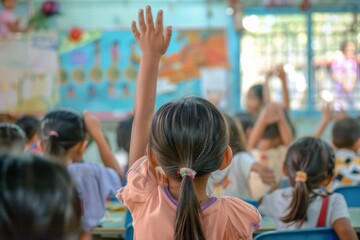 Students in the classroom are actively engaged in learning. They eagerly raise their hands to participate in discussions and answer questions, creating a lively educational environment