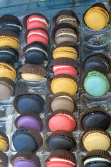 Set of different multi-colored macaroon cookies, a French sweet delicacy. Food background.