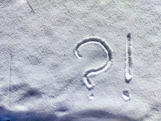 Question Mark Drawn in Fresh Snow on a Winter Morning