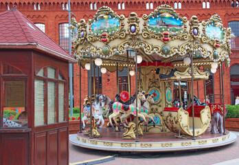 Carousel for children. Fun children's attraction in the city