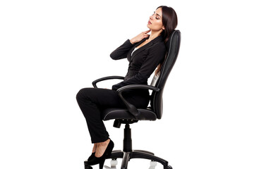 Fototapeta premium Businesswoman sitting on a desk chair and holding a painfull stiff neck. Combatting Neck Pain